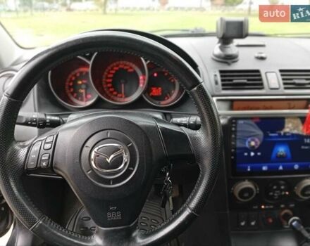 Черный Мазда 3, объемом двигателя 2 л и пробегом 242 тыс. км за 5000 $, фото 32 на Automoto.ua