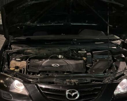 Черный Мазда 3, объемом двигателя 2 л и пробегом 346 тыс. км за 4700 $, фото 17 на Automoto.ua