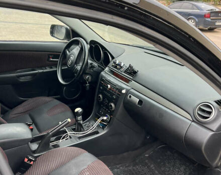 Черный Мазда 3, объемом двигателя 2 л и пробегом 232 тыс. км за 4700 $, фото 6 на Automoto.ua