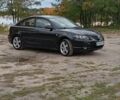Черный Мазда 3, объемом двигателя 2 л и пробегом 242 тыс. км за 5000 $, фото 8 на Automoto.ua