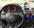 Черный Мазда 3, объемом двигателя 2 л и пробегом 242 тыс. км за 5000 $, фото 1 на Automoto.ua