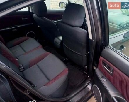 Чорний Мазда 3, об'ємом двигуна 2 л та пробігом 245 тис. км за 5200 $, фото 13 на Automoto.ua