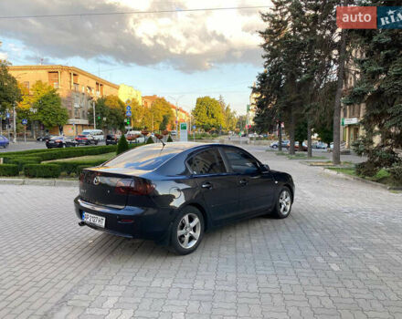 Черный Мазда 3, объемом двигателя 2 л и пробегом 300 тыс. км за 5200 $, фото 3 на Automoto.ua