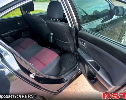 Черный Мазда 3, объемом двигателя 2 л и пробегом 250 тыс. км за 5200 $, фото 6 на Automoto.ua
