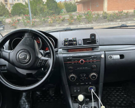 Черный Мазда 3, объемом двигателя 2 л и пробегом 232 тыс. км за 4700 $, фото 7 на Automoto.ua