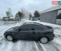 Черный Мазда 3, объемом двигателя 2 л и пробегом 266 тыс. км за 3950 $, фото 1 на Automoto.ua