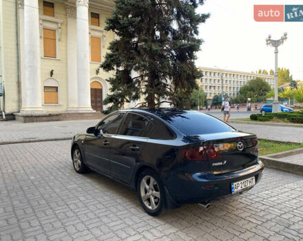 Черный Мазда 3, объемом двигателя 2 л и пробегом 300 тыс. км за 5200 $, фото 1 на Automoto.ua