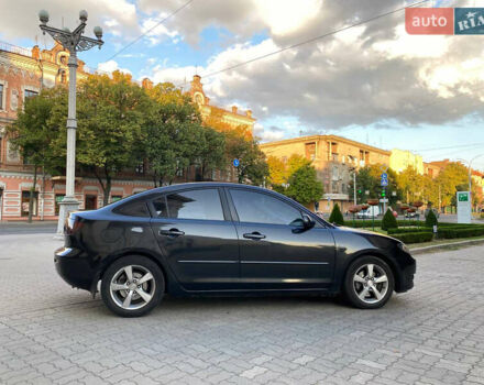 Черный Мазда 3, объемом двигателя 2 л и пробегом 300 тыс. км за 5200 $, фото 2 на Automoto.ua