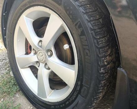 Чорний Мазда 3, об'ємом двигуна 1.6 л та пробігом 230 тис. км за 4500 $, фото 4 на Automoto.ua