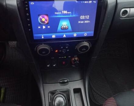 Чорний Мазда 3, об'ємом двигуна 2 л та пробігом 245 тис. км за 5200 $, фото 11 на Automoto.ua