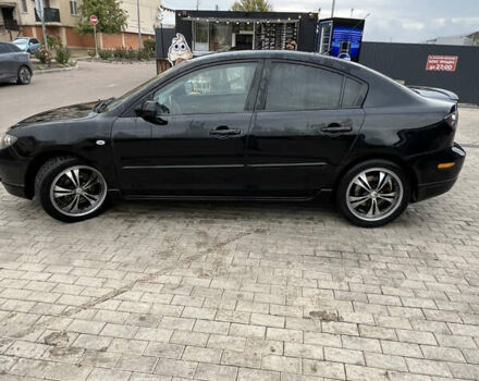 Черный Мазда 3, объемом двигателя 2 л и пробегом 232 тыс. км за 4700 $, фото 4 на Automoto.ua