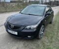 Черный Мазда 3, объемом двигателя 1.6 л и пробегом 276 тыс. км за 4000 $, фото 1 на Automoto.ua