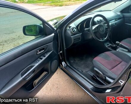 Черный Мазда 3, объемом двигателя 2 л и пробегом 250 тыс. км за 5200 $, фото 4 на Automoto.ua