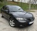 Черный Мазда 3, объемом двигателя 1.6 л и пробегом 275 тыс. км за 5149 $, фото 1 на Automoto.ua