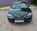 Черный Мазда 3, объемом двигателя 2 л и пробегом 250 тыс. км за 5200 $, фото 1 на Automoto.ua