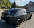 Чорний Мазда 3, об'ємом двигуна 1.6 л та пробігом 180 тис. км за 4314 $, фото 12 на Automoto.ua