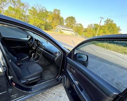 Черный Мазда 3, объемом двигателя 2 л и пробегом 259 тыс. км за 6000 $, фото 8 на Automoto.ua