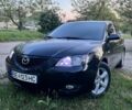 Черный Мазда 3, объемом двигателя 1.6 л и пробегом 190 тыс. км за 6000 $, фото 1 на Automoto.ua