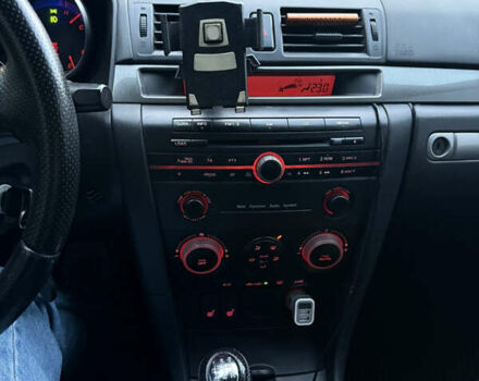 Черный Мазда 3, объемом двигателя 2 л и пробегом 260 тыс. км за 4950 $, фото 9 на Automoto.ua