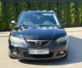 Черный Мазда 3, объемом двигателя 1.6 л и пробегом 209 тыс. км за 4800 $, фото 1 на Automoto.ua