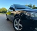 Чорний Мазда 3, об'ємом двигуна 1.6 л та пробігом 201 тис. км за 5502 $, фото 1 на Automoto.ua