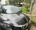 Черный Мазда 3, объемом двигателя 1.6 л и пробегом 230 тыс. км за 5600 $, фото 1 на Automoto.ua
