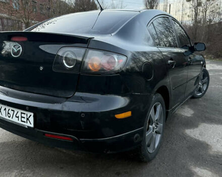 Черный Мазда 3, объемом двигателя 2 л и пробегом 260 тыс. км за 4950 $, фото 4 на Automoto.ua