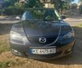 Чорний Мазда 3, об'ємом двигуна 1.6 л та пробігом 327 тис. км за 4700 $, фото 1 на Automoto.ua