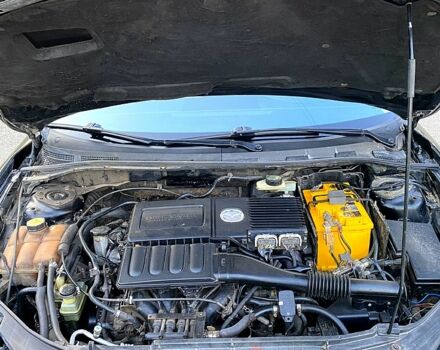 Черный Мазда 3, объемом двигателя 1.6 л и пробегом 300 тыс. км за 4800 $, фото 7 на Automoto.ua