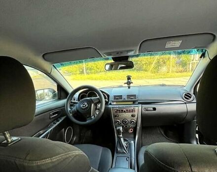 Черный Мазда 3, объемом двигателя 2 л и пробегом 259 тыс. км за 6000 $, фото 6 на Automoto.ua