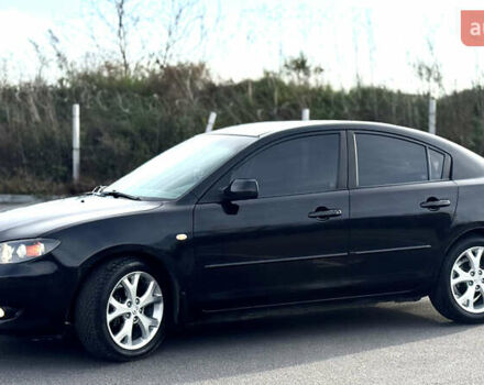 Чорний Мазда 3, об'ємом двигуна 1.6 л та пробігом 237 тис. км за 5850 $, фото 4 на Automoto.ua