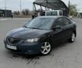 Черный Мазда 3, объемом двигателя 1.6 л и пробегом 250 тыс. км за 4550 $, фото 1 на Automoto.ua