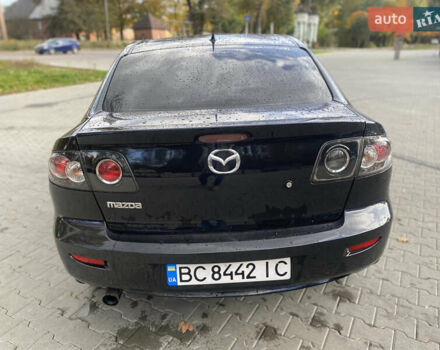 Чорний Мазда 3, об'ємом двигуна 1.6 л та пробігом 203 тис. км за 4350 $, фото 6 на Automoto.ua