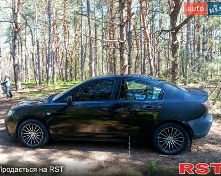 Черный Мазда 3, объемом двигателя 1.6 л и пробегом 257 тыс. км за 4000 $, фото 6 на Automoto.ua
