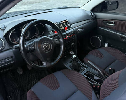 Черный Мазда 3, объемом двигателя 2 л и пробегом 260 тыс. км за 4950 $, фото 14 на Automoto.ua