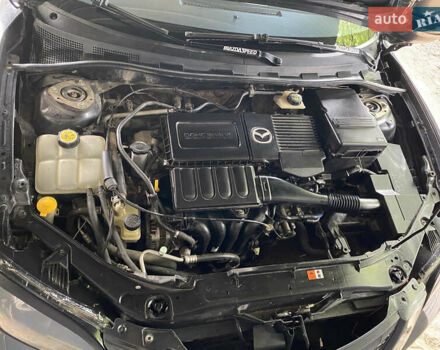 Черный Мазда 3, объемом двигателя 1.6 л и пробегом 176 тыс. км за 5699 $, фото 9 на Automoto.ua