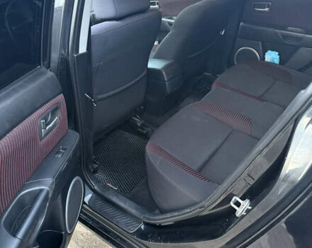 Черный Мазда 3, объемом двигателя 2 л и пробегом 260 тыс. км за 4950 $, фото 15 на Automoto.ua