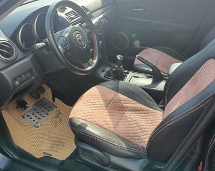 Черный Мазда 3, объемом двигателя 2 л и пробегом 187 тыс. км за 5300 $, фото 2 на Automoto.ua