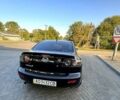 Черный Мазда 3, объемом двигателя 2 л и пробегом 259 тыс. км за 6000 $, фото 1 на Automoto.ua