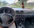 Чорний Мазда 3, об'ємом двигуна 1.6 л та пробігом 356 тис. км за 2000 $, фото 1 на Automoto.ua