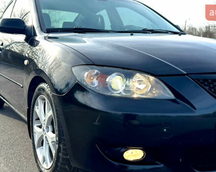 Чорний Мазда 3, об'ємом двигуна 1.6 л та пробігом 237 тис. км за 5850 $, фото 14 на Automoto.ua