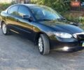 Черный Мазда 3, объемом двигателя 2 л и пробегом 202 тыс. км за 6000 $, фото 1 на Automoto.ua