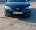 Черный Мазда 3, объемом двигателя 1.6 л и пробегом 225 тыс. км за 5500 $, фото 1 на Automoto.ua