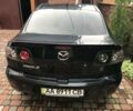 Черный Мазда 3, объемом двигателя 2 л и пробегом 151 тыс. км за 4900 $, фото 1 на Automoto.ua