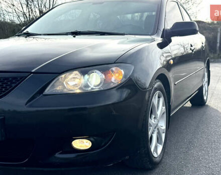 Чорний Мазда 3, об'ємом двигуна 1.6 л та пробігом 237 тис. км за 5850 $, фото 13 на Automoto.ua