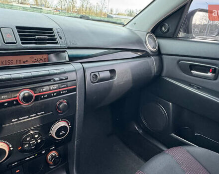 Чорний Мазда 3, об'ємом двигуна 1.6 л та пробігом 237 тис. км за 5850 $, фото 45 на Automoto.ua