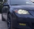 Черный Мазда 3, объемом двигателя 1.6 л и пробегом 180 тыс. км за 5800 $, фото 1 на Automoto.ua