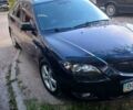 Черный Мазда 3, объемом двигателя 2 л и пробегом 151 тыс. км за 4800 $, фото 1 на Automoto.ua