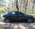 Чорний Мазда 3, об'ємом двигуна 1.6 л та пробігом 255 тис. км за 4000 $, фото 1 на Automoto.ua