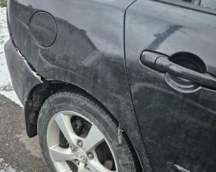 Чорний Мазда 3, об'ємом двигуна 1.6 л та пробігом 356 тис. км за 2000 $, фото 1 на Automoto.ua